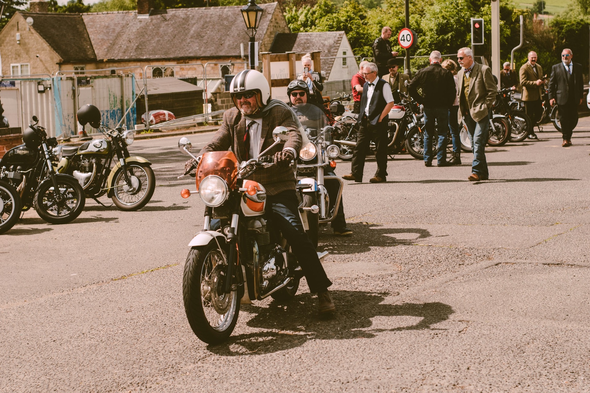 Classic motorcycle on a British village street